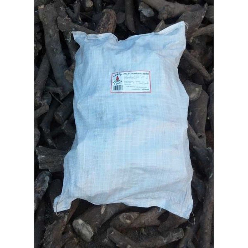 Leña de naranjo para paellas en saco 15 Kg